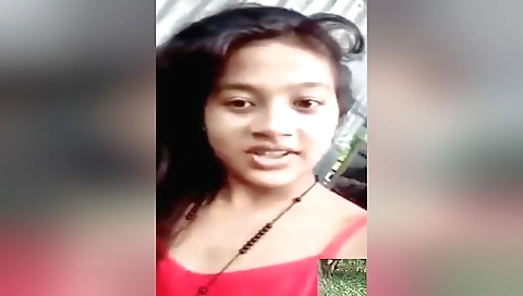 Amateur brunette fucks her pussy in the village outdoors