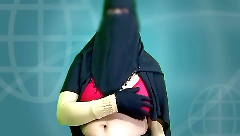 Housewife queen in sexy black clothes and red dress is playing