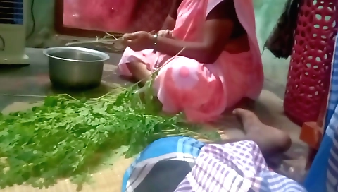 A shaved indian girl with a nice pussy is working by a fire