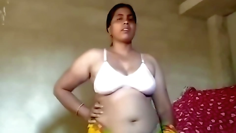 Indian housewife in a sexy white dress plays with her body