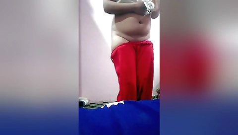Indian pornstar taking care of her dick in the bedroom