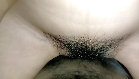 Indian hairy teen plays with her hairy cunt in POV video