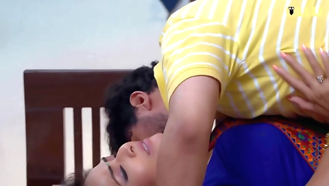 The babe gets off in her bra and panties in an erotic indian movie