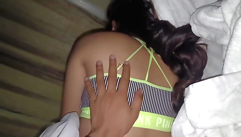 Hot amateur teenie in a hotel room with a hot sex video