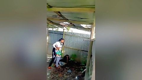 Indian girl in her bed with friend filmed outdoors