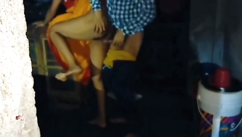 Indian housewife in beautiful village with her husband