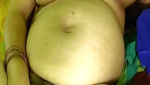 Indian girl with a hairy pussy fucks a dildo on webcam