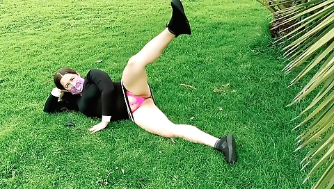 Beautiful brunette solo shows off her sexy body in the park