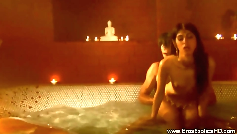 Brunette milf with a sexy face and a nice body in her bedroom