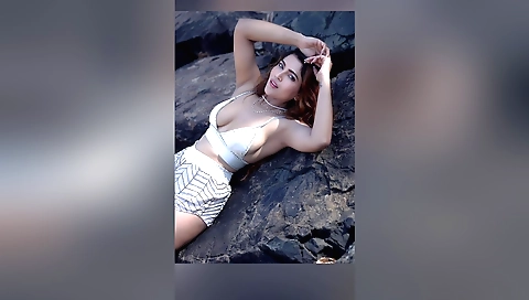 Red head outdoor solo video with her man on the beach