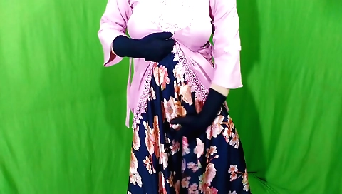 Hot housewife in a sexy outfit masturbates on camera