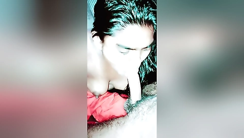 A brunette with a nice round ass sucks a deep throat