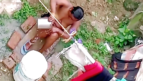 Indian woman with big tits and a sexy face has a wild sex in yard