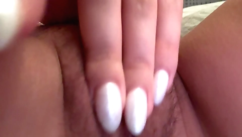 Indian girl in bed having a fetish with her hairy pussy