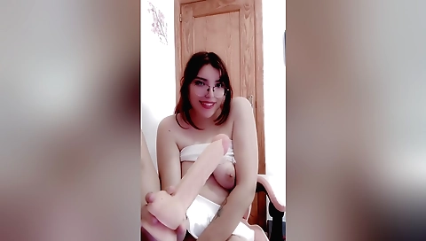 Horny stepsister is getting her tits pumped with a dildo