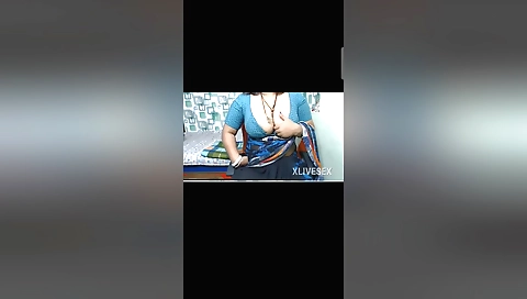 Indian girl showing off her breasts in a sexy nude video