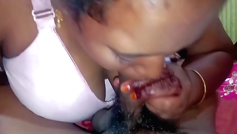 Brunette girl in a red dress rides her boyfriend's dick