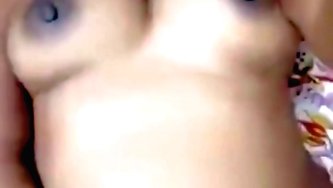 Indian chick in a sexy outfit is showing off her breasts